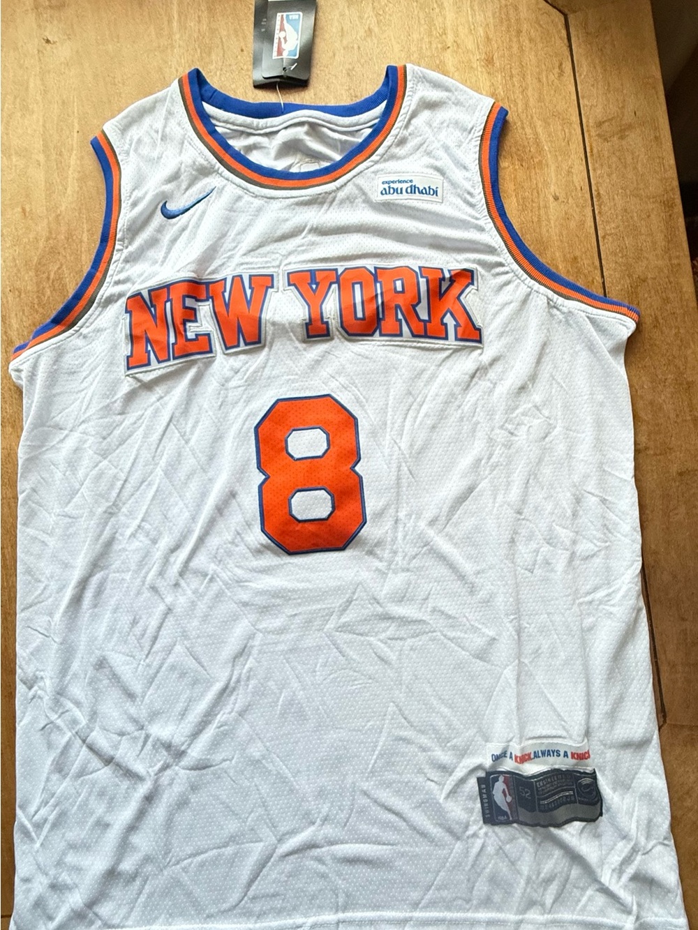 Nike White New York Basketball Jersey with Orange & Blue Trim